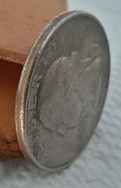 Extreme-Rim-Wear-On-A-Washington-Quarter